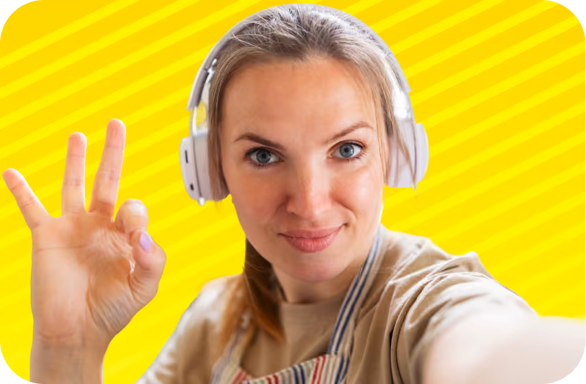 Woman wearing headphones and smiling