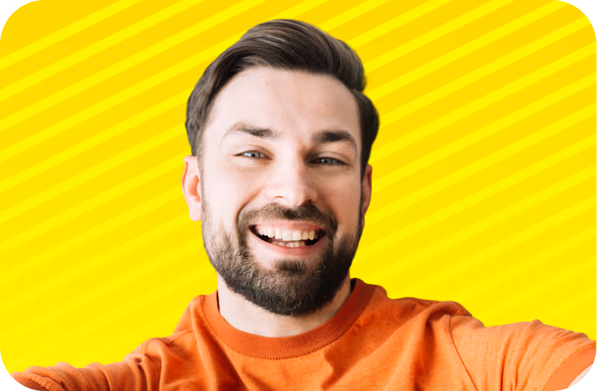 Man smiling in an orange t-shirt